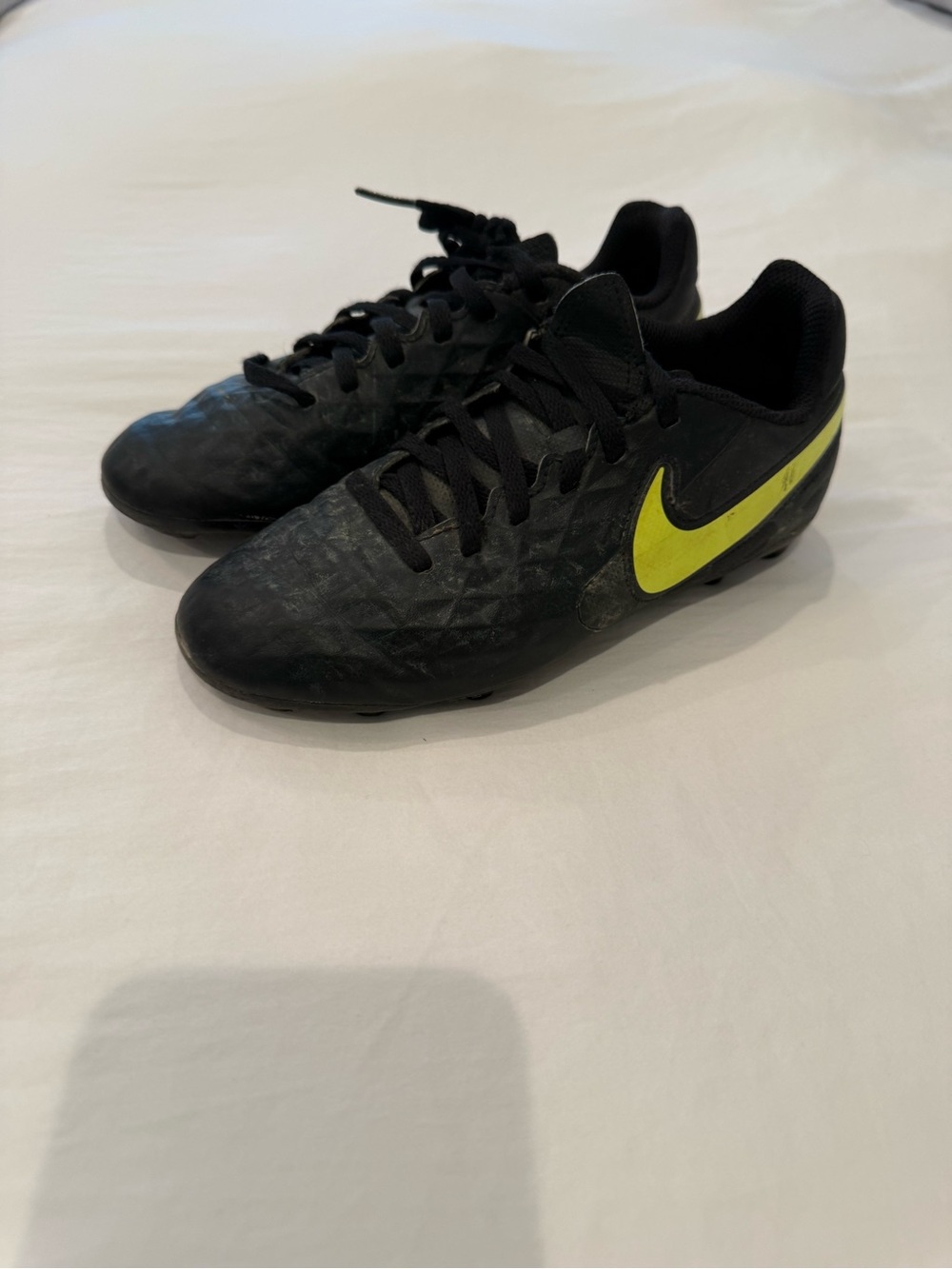 Nike Black kids’s baseball or  Soccer Cleats with Volt Swoosh Accent size 1